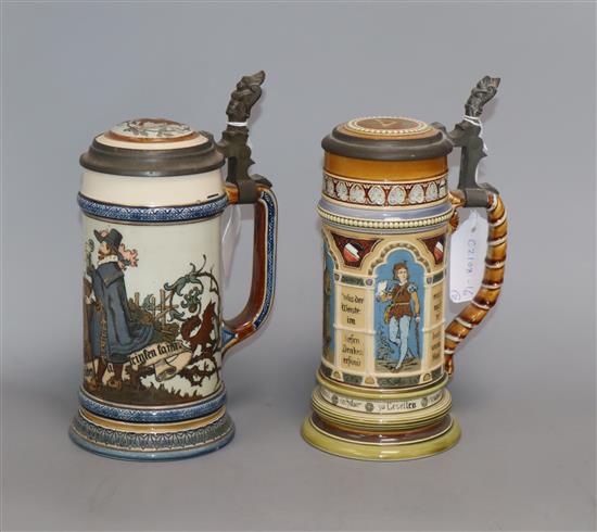 A Mettlach stein decorated with panels of figures and another with a gentleman drinking height 22.5cm